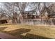 Expansive backyard with lush green grass and a privacy fence, offering ample space for recreation at 17085 E Dorado Cir, Centennial, CO 80015