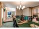 Elegant dining room with a view to the living room and staircase at 17085 E Dorado Cir, Centennial, CO 80015