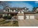 Charming two-story home with brick accents and a three car garage at 17085 E Dorado Cir, Centennial, CO 80015