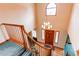 Elegant foyer with hardwood floors, a grand staircase, and a decorative chandelier at 17085 E Dorado Cir, Centennial, CO 80015