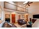 Open floor plan shows living room, dining room and second floor overlook at 17085 E Dorado Cir, Centennial, CO 80015