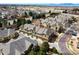 Aerial view of townhome complex showcasing well-maintained landscaping and architecture at 11230 Osage Cir # B, Northglenn, CO 80234