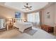 Relaxing bedroom with a ceiling fan, carpet, and natural light at 11230 Osage Cir # B, Northglenn, CO 80234