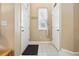 Bright foyer with tile flooring and a coat closet offering a welcoming entrance at 11230 Osage Cir # B, Northglenn, CO 80234