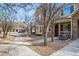 Charming two-story townhouse with stone accents, bay window, and inviting front entrance at 11230 Osage Cir # B, Northglenn, CO 80234