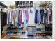 Organized walk-in closet featuring shelves for clothing, shoes, and accessories in a well-lit space at 11230 Osage Cir # B, Northglenn, CO 80234