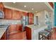 Kitchen features stainless-steel appliances, granite countertops, and a convenient center island at 6495 S Harvest St, Aurora, CO 80016