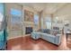 Cozy living room features a fireplace, lots of natural light, and vaulted ceilings at 6495 S Harvest St, Aurora, CO 80016