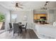 Cozy dining area with stylish lighting, hardwood floors, and easy access to the kitchen at 5193 E 119Th Way, Thornton, CO 80233