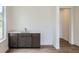 A conveniently located wet bar featuring dark cabinets and light countertops at 4592 Windmill Dr, Brighton, CO 80601