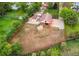 Aerial view of property with fenced yard, barn, and storage shed at 7785 W 5Th Ave, Lakewood, CO 80226