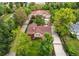Expansive aerial view of a single Gathering home, large backyard, barn, and detached garage at 7785 W 5Th Ave, Lakewood, CO 80226