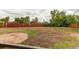 Spacious backyard featuring a lawn and a dirt area at 7785 W 5Th Ave, Lakewood, CO 80226