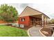 Barn with horse stalls, well-maintained grounds, and a convenient drive-through layout with ample parking space at 7785 W 5Th Ave, Lakewood, CO 80226