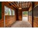 Barn stall with wooden walls, natural light, and metal bars for optimal animal safety and comfort at 7785 W 5Th Ave, Lakewood, CO 80226