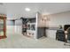Partially finished basement features laundry area and additional space for storage or hobbies at 7784 Lewis St, Arvada, CO 80005