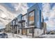 Modern townhome community with light blue and white buildings at 2570 Josephine Way, Superior, CO 80027