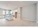 Modern kitchen with white cabinets, island, and gray countertops at 2570 Josephine Way, Superior, CO 80027