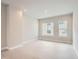 Spacious living room with light wood floors and large windows at 2570 Josephine Way, Superior, CO 80027