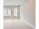 Bright living room with light wood floors and large windows at 2570 Josephine Way, Superior, CO 80027