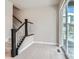 Modern staircase with dark wood railing and white risers at 2570 Josephine Way, Superior, CO 80027