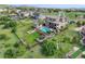 Aerial view of property featuring pool, outdoor living spaces, and lush landscaping at 5623 Raintree Dr, Parker, CO 80134