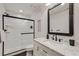 Elegant bathroom with white subway tile shower and modern black hardware accents at 5623 Raintree Dr, Parker, CO 80134