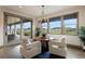 Bright breakfast nook with sliding glass doors leading to the outdoor space and scenic views at 5623 Raintree Dr, Parker, CO 80134