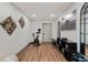 Well-equipped home gym featuring exercise equipment, storage solutions, and modern decor at 5623 Raintree Dr, Parker, CO 80134