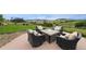 Cozy outdoor firepit area with comfortable seating and a beautiful view at 5623 Raintree Dr, Parker, CO 80134