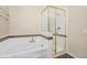 Bathroom with a shower and bathtub at 4258 Tennyson St # 104, Denver, CO 80212