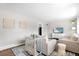 Cozy living room featuring stylish decor, comfortable furniture, and hardwood flooring at 2502 S Lima St, Aurora, CO 80014