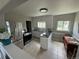 The kitchen is equipped with modern stainless appliances and eat in nook at 1237 Tamarac St, Denver, CO 80220