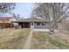Spacious backyard featuring a hot tub and well-maintained lawn at 2285 Ironton St, Aurora, CO 80010