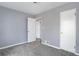 Bedroom featuring neutral paint and new carpet at 2285 Ironton St, Aurora, CO 80010
