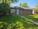 Charming brick home with a well-manicured lawn and mature trees in a desirable neighborhood at 2285 Ironton St, Aurora, CO 80010