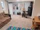 Finished basement with ample space for activities, and instruments perfect for entertainment or hobbies at 10806 W Evans Ave # 5, Lakewood, CO 80227
