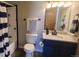 Bathroom featuring white subway tile in the shower and black hardware and accents at 10806 W Evans Ave # 5, Lakewood, CO 80227