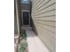 Exterior shot highlighting the front door, walkway, and landscaped entrance at 10806 W Evans Ave # 5, Lakewood, CO 80227