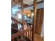 Inviting interior view showcases wood finishes, open layout, and a glimpse of the kitchen with modern appliances at 10806 W Evans Ave # 5, Lakewood, CO 80227