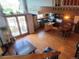 Open concept kitchen and living area with hardwood floors and natural light at 10806 W Evans Ave # 5, Lakewood, CO 80227