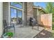 Private patio with outdoor seating and a grill, perfect for enjoying the outdoors at 10806 W Evans Ave # 5, Lakewood, CO 80227