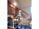 Unique staircase and landing with interesting wall art and decor at 10806 W Evans Ave # 5, Lakewood, CO 80227