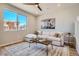Comfortable living room with lots of natural light and ample seating at 95 N Vandriver Pl, Aurora, CO 80018