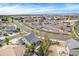 Aerial view of a neighborhood highlighting proximity to parking, commercial, and residential areas at 4873 Cathay Ct, Denver, CO 80249