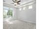 Spacious bedroom with carpeted floor, ample natural light and tray ceiling at 4873 Cathay Ct, Denver, CO 80249