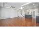 Large living room features hardwood floors and an open floor plan at 4873 Cathay Ct, Denver, CO 80249