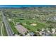 An aerial view of the community park showcases walking trails, play areas, and green space at 7506 Chipmunk Pl, Littleton, CO 80125
