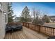 Spacious wooden deck providing great outdoor living space for entertaining at 7506 Chipmunk Pl, Littleton, CO 80125