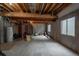 Spacious unfinished basement area with exposed ceiling and potential for customization at 7506 Chipmunk Pl, Littleton, CO 80125